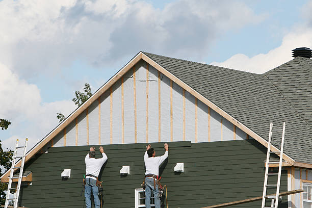 Professional Siding technician working in Newell, WV